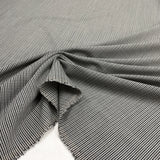 Tissu Polyester et Laine à Carreaux, à retrouver sur tessuti.fr