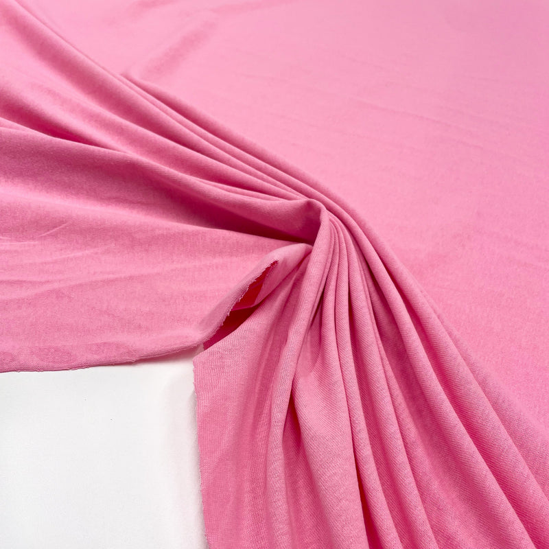 Tissu Coton Jersey rose, à retrouver dés maintenant sur tessuti.fr