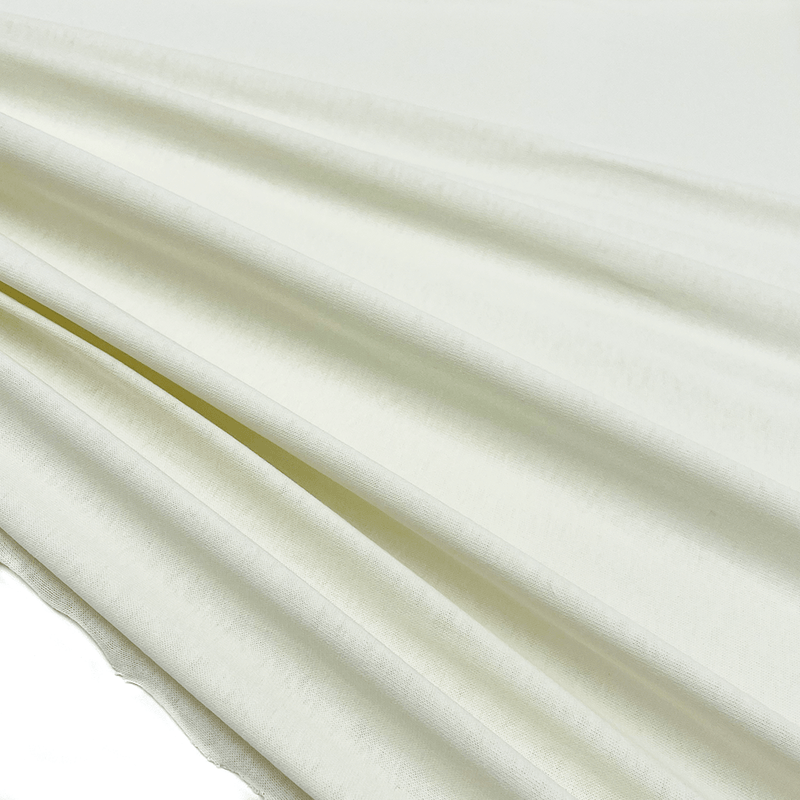 Ivory cotton fabric made in Italy, shop now on en.tessuti.fr