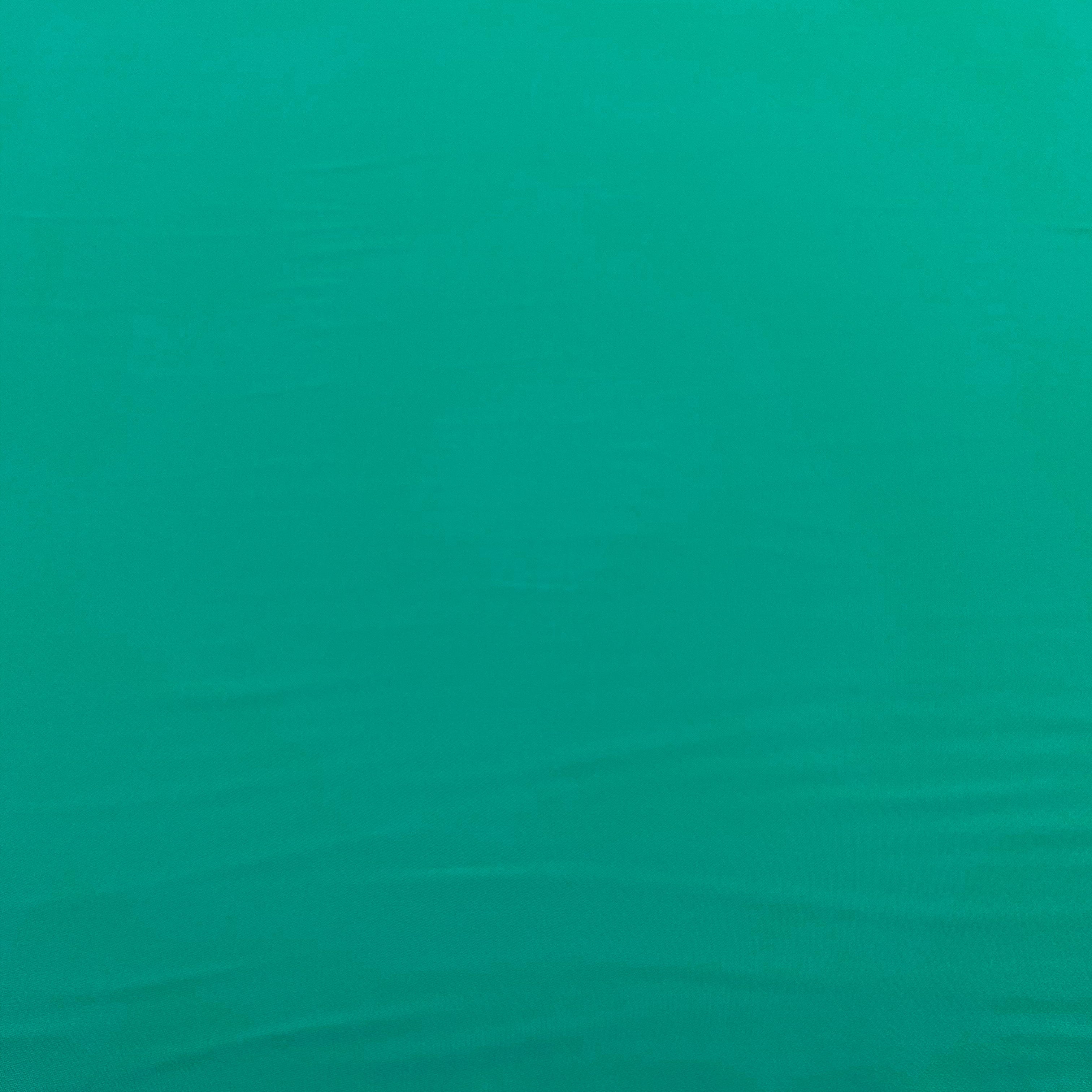 Fabric Crepe of Turquoise Polyester Made in Italy, to be found on en.tessuti.fr