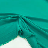 Tissu Crêpe de Polyester Turquoise, à retrouver sur tessuti.fr