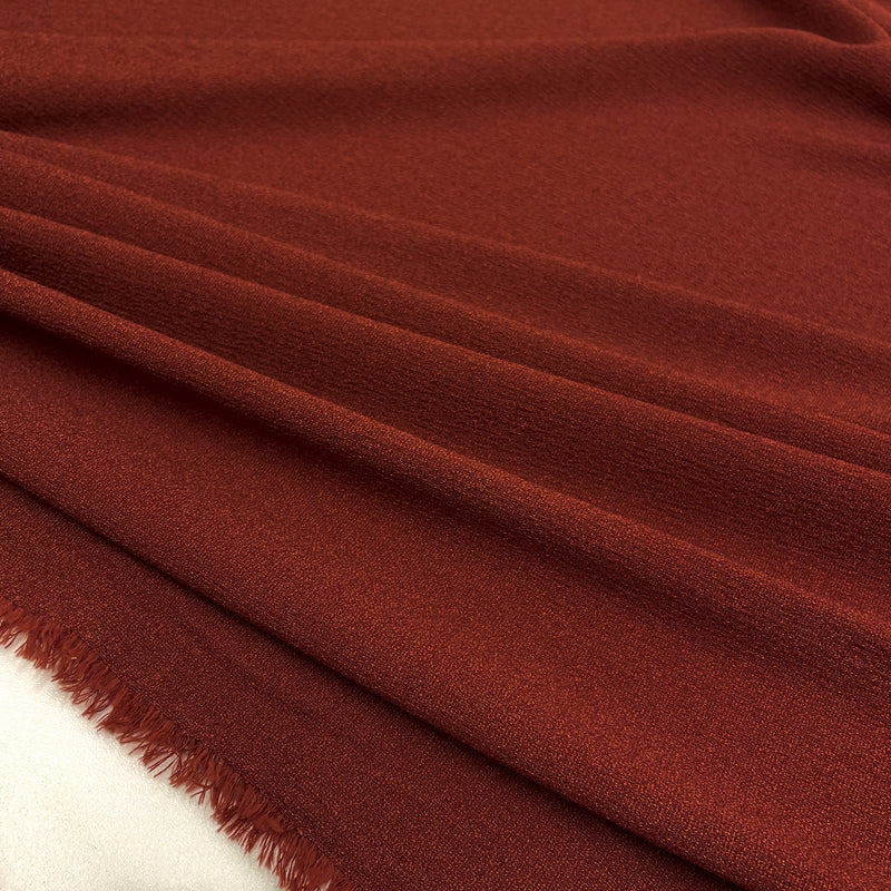 Tissu Crêpe de Polyester Rouge Made in Italy, à retrouver dés maintenant sur tessuti.fr
